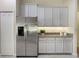 Kitchen featuring stainless steel refrigerator and granite countertops at 3844 Bedford Ave, Winter Haven, FL 33884