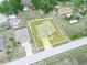 Aerial view of the property showcasing the home's position within the community at 409 N 6Th St, Lake Hamilton, FL 33851