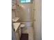 Clean bathroom with white fixtures, tub/shower combination, and neutral flooring at 418 Tivoli Park Dr, Davenport, FL 33897