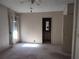 Main bedroom featuring neutral carpet, a ceiling fan, and an en-suite bathroom at 418 Tivoli Park Dr, Davenport, FL 33897