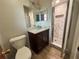 Bathroom features granite countertops, modern vanity and glass shower enclosure at 4211 Sunny Land Dr, Lakeland, FL 33813