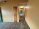 Hallway showcasing the wood-look tile flooring and wall paint at 4211 Sunny Land Dr, Lakeland, FL 33813