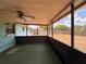 View of screened-in back porch area with full view of the backyard at 4211 Sunny Land Dr, Lakeland, FL 33813