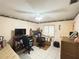 Bedroom with a work station illuminated by a window with tile flooring and border design at 426 Gleneagles Ct, Winter Haven, FL 33884