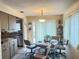 Inviting dining area with a slider to the outdoors and lots of natural light at 426 Gleneagles Ct, Winter Haven, FL 33884