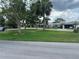 Quiet street showing a well-manicured neighborhood at 426 Gleneagles Ct, Winter Haven, FL 33884