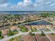 Beautiful home with palm trees and manicured lawns in a neighborhood with lake views at 4327 Gullane Dr, Lake Wales, FL 33859