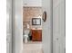 Hall bathroom with tiled floors and walls, featuring a shower/tub combo, and a vanity at 4327 Gullane Dr, Lake Wales, FL 33859