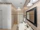 Bathroom featuring a walk-in shower with wall-to-wall tile at 4327 Gullane Dr, Lake Wales, FL 33859