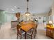Open-concept dining area showing the kitchen and living room layout of the house at 4327 Gullane Dr, Lake Wales, FL 33859