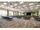 Large event space with tables, chairs, and a stage, perfect for hosting large gatherings at 4327 Gullane Dr, Lake Wales, FL 33859