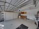 Large garage with ample storage space and room for multiple vehicles or hobbies at 4327 Gullane Dr, Lake Wales, FL 33859