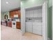 Convenient laundry closet situated off the kitchen with washer and dryer at 4327 Gullane Dr, Lake Wales, FL 33859