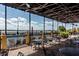 Outdoor patio featuring a pool view, tables, and chairs, ideal for al fresco dining at 4327 Gullane Dr, Lake Wales, FL 33859
