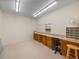 Versatile room with ample counter space and cabinets, perfect for hobbies or storage at 4327 Gullane Dr, Lake Wales, FL 33859