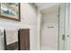 Bathroom featuring a glass-door walk-in shower, with neutral decor and decorative towels at 441 San Jose Dr, Winter Haven, FL 33884