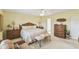 Comfortable main bedroom featuring a ceiling fan and decorative accents at 441 San Jose Dr, Winter Haven, FL 33884