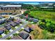 An aerial view of the home's location in a quiet neighborhood near a large greenbelt area at 476 Haines Trl, Winter Haven, FL 33881