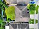 Aerial view of the home, showing roof, backyard, and proximity to neighbors at 476 Haines Trl, Winter Haven, FL 33881