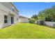 A spacious backyard with a storage shed and privacy fence offers a perfect blend of functionality and seclusion at 476 Haines Trl, Winter Haven, FL 33881