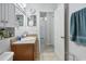 Well-lit bathroom featuring single sink vanity and convenient towel rack at 476 Haines Trl, Winter Haven, FL 33881