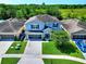 Two story home with a well manicured lawn and a two car garage at 476 Haines Trl, Winter Haven, FL 33881