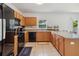 Kitchen features black appliances and cabinets at 476 Haines Trl, Winter Haven, FL 33881