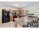 Bright kitchen with bar top dining area at 476 Haines Trl, Winter Haven, FL 33881