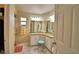 A spacious double vanity bathroom with granite countertops, and great lighting at 492 Sweetwater Way, Haines City, FL 33844