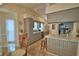 Charming kitchen with grey cabinetry, tile backsplash, eat-in nook, and stainless appliances at 492 Sweetwater Way, Haines City, FL 33844