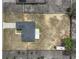 An aerial view of the home shows the entire lot and surrounding fence lines at 541 Hatchwood Dr, Haines City, FL 33844