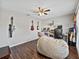 Bright, spacious home office featuring laminate floors, natural light, and ceiling fan at 541 Hatchwood Dr, Haines City, FL 33844