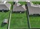 Expansive backyard featuring a well-maintained lawn and privacy fence, perfect for outdoor activities and relaxation at 620 Jaxson Blvd, Winter Haven, FL 33880