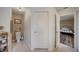 Bathroom featuring toilet, stylish floors, and a door into the adjacent bedroom at 620 Jaxson Blvd, Winter Haven, FL 33880