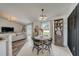 Bright and welcoming dining area with open access to the kitchen and living room at 620 Jaxson Blvd, Winter Haven, FL 33880