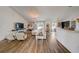 Spacious living room offers wood floors, neutral decor, and an open concept layout at 620 Jaxson Blvd, Winter Haven, FL 33880