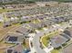 Aerial view of a home with the neighborhood surrounding it and other rooftops at 622 Taft Dr, Davenport, FL 33837