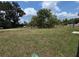 Sprawling lot with mature trees and lush greenery, offering a serene and private setting at 628 Se Pine Ave, Fort Meade, FL 33841