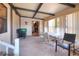 Outdoor living space providing extra room for dining and storage, with ample natural light at 6470 Peppertree Ne Path, Winter Haven, FL 33881