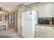 Well-lit kitchen with modern appliances and ample counter space at 6470 Peppertree Ne Path, Winter Haven, FL 33881