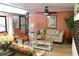Comfortable lobby featuring a sofa, decorative pillows, coffee table, and colorful decor at 700 Mirror Nw Ter # 303, Winter Haven, FL 33881