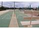 Active shuffleboard court ready for play and a fun way to get to know your neighbors at 700 Mirror Nw Ter # 303, Winter Haven, FL 33881