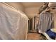 Spacious walk-in closet with ample storage and well-organized shelving and hanging racks at 710 Persian Dr, Haines City, FL 33844