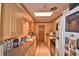 Functional kitchen featuring ample countertop space and a skylight for natural light at 780 Oleander Se Dr, Winter Haven, FL 33880