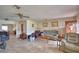 Bright and airy living room with tile flooring and plenty of seating space at 780 Oleander Se Dr, Winter Haven, FL 33880