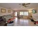 Comfortable living room featuring tile flooring and plenty of natural light at 780 Oleander Se Dr, Winter Haven, FL 33880