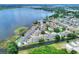 Aerial shot of the community shows the community pool and surrounding lakes at 900 Avenue Z Se # B2, Winter Haven, FL 33880