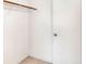 Walk-in closet featuring open storage and neutral walls at 900 Avenue Z Se # B2, Winter Haven, FL 33880