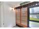 Screened patio with decor and a view of the community pool at 900 Avenue Z Se # B2, Winter Haven, FL 33880