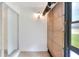 Enclosed patio with tile flooring, bamboo blinds, and a sliding glass door at 900 Avenue Z Se # B2, Winter Haven, FL 33880